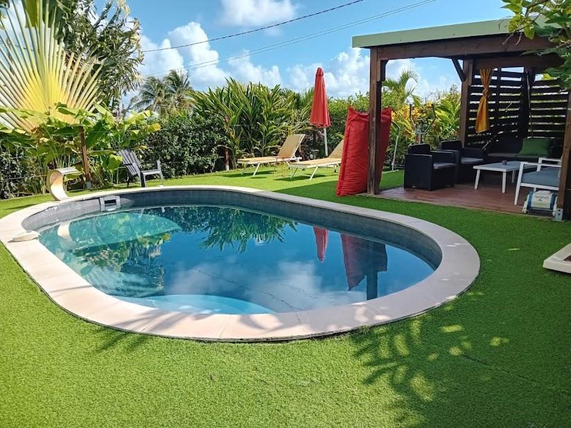 Villa Au Coeur Du Papillon Piscine Collective En Famille Goyave Exterior foto
